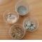 Échantillons présentant les constituants d’un béton ordinaire : eau, ciment, sable et granulats